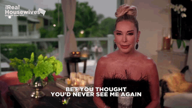 a real housewives advertisement with a woman in a black dress