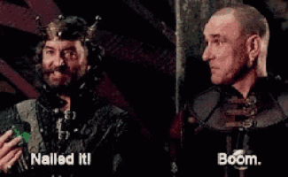 two men are standing next to each other and one of them is wearing a crown and the other is bald