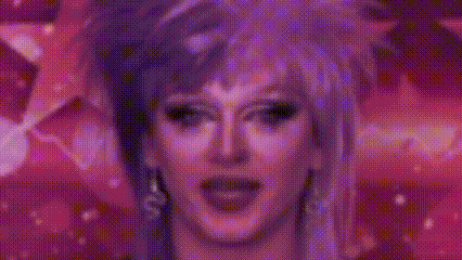 a woman with purple hair is standing in front of a pink background .