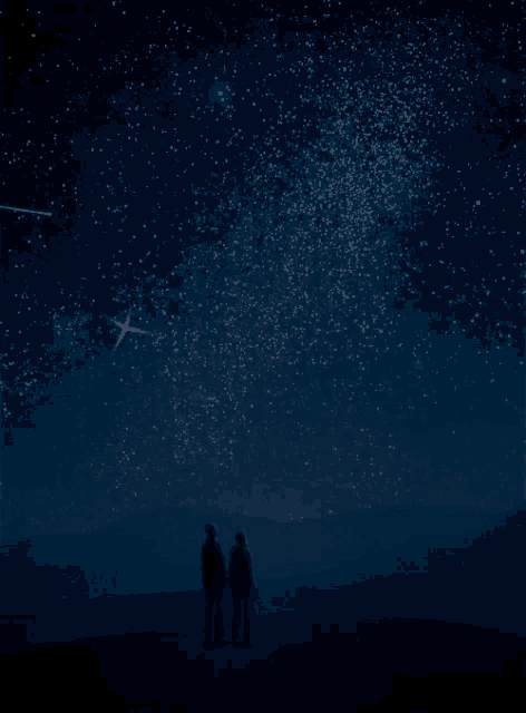 two people looking up at a starry sky