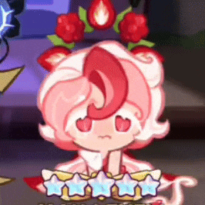 a cartoon girl with pink hair and a crown of strawberries on her head is sitting on a table .