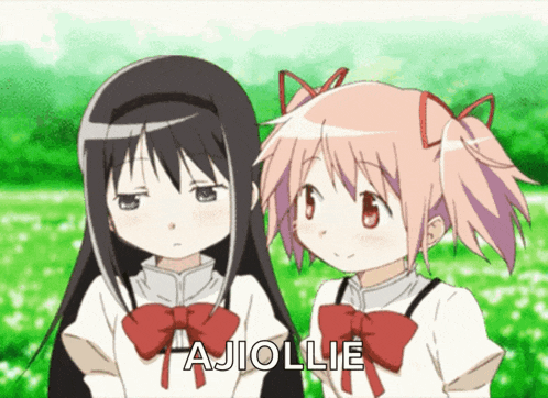 two anime girls are standing next to each other and the word ajiolie is on the bottom left