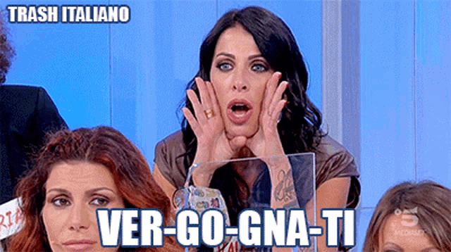 a woman with a surprised look on her face and the words ver-go-gna-ti
