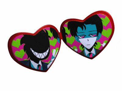 a pair of heart shaped mirrors with a man in a suit and tie on them