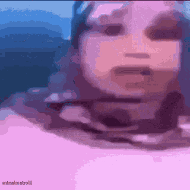 a close up of a person 's face with a pink background and the words animatroll on the bottom