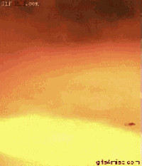 a gif of a sunset with the words gif kiss.com on the bottom