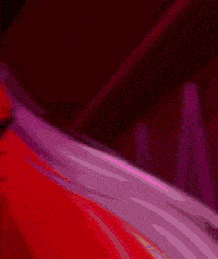 a red and purple background with a blurred image of a person