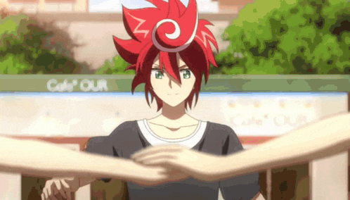 a boy with red hair is holding another person 's hand in front of a cafe