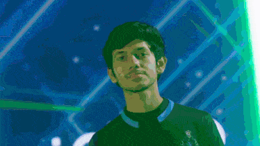 a man is standing in front of a screen with the word soul on it