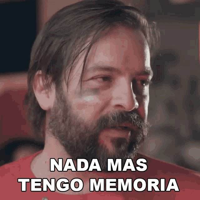 a man with a beard has a black spot on his forehead and says nada mas tengo memoria