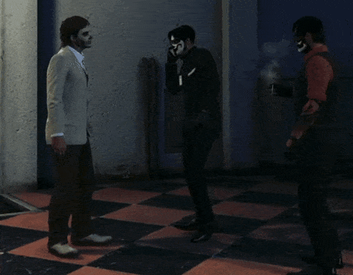 a man with a mask on his face talks on a cell phone