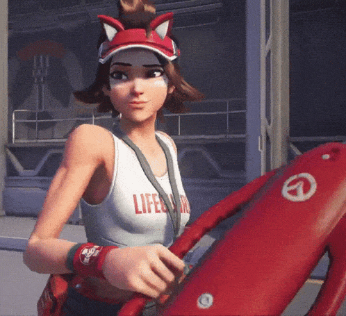 a woman in a lifeguard outfit is holding a red lifeguard float