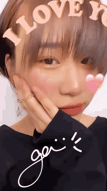 a woman with a heart on her face and the words i love you written on her head