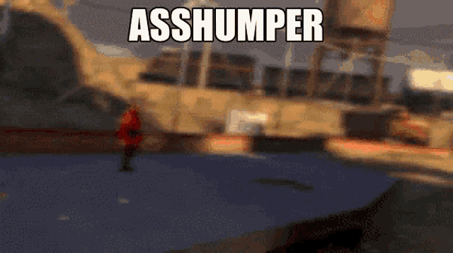 a blurry picture of a person with the words asshumper written on it