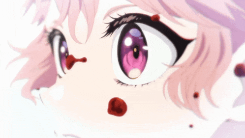 a close up of a girl 's eye with blood coming out of it .