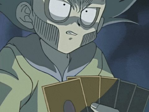 a cartoon character is holding a deck of cards