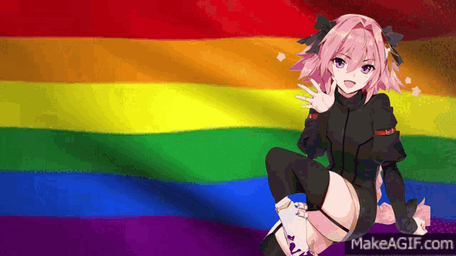 a girl is sitting in front of a rainbow flag with makeagif.com at the bottom