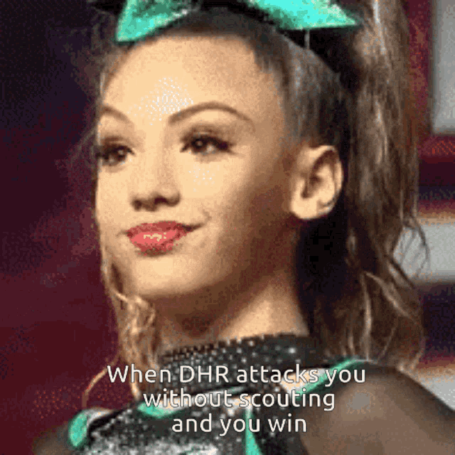 a cheerleader with a green bow on her head and the words when dhr attacks you without scouting and you win above her