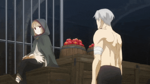 a man and a woman are standing next to each other in a dark room