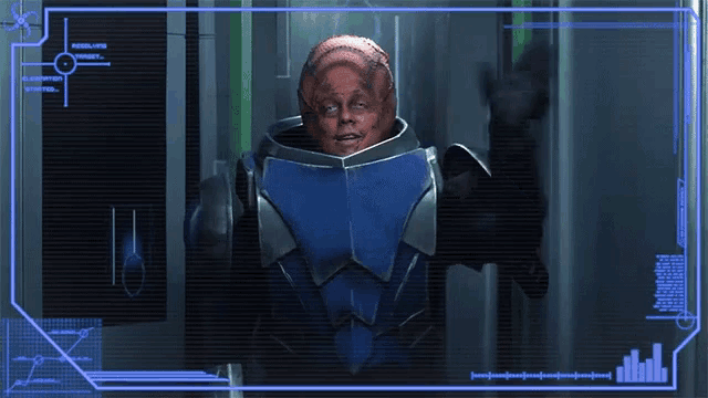 a man in a futuristic suit is standing in front of a screen that says ' sc ' on it