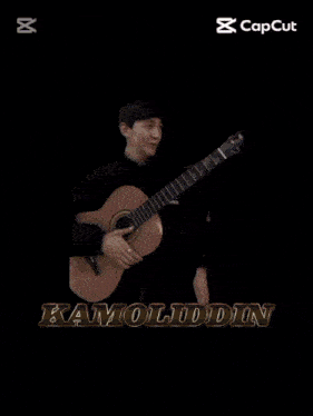 a blurred image of a person with the word kamoliddin written on the bottom