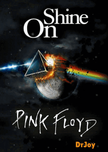 a pink floyd poster with a rainbow coming out of a planet