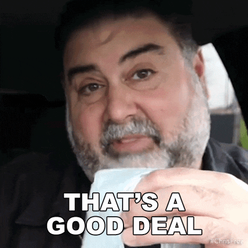 a man with a beard holds a piece of paper that says that 's a good deal