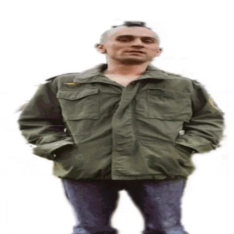 a man with a mohawk is wearing a green jacket and jeans