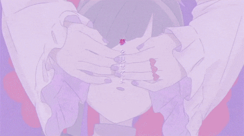 a girl with purple nails is covering her eyes