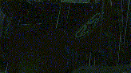 a lego pirate is holding a sword in a dark room