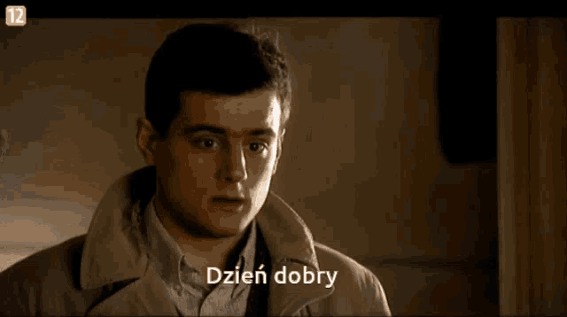 a man in a trench coat says dzień dobry