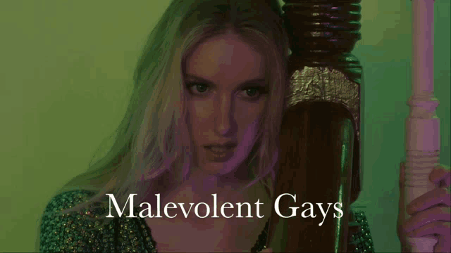 a woman is holding a pole and the words malevolent gays are on the bottom