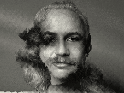 a black and white photo of a man with long hair and a beard