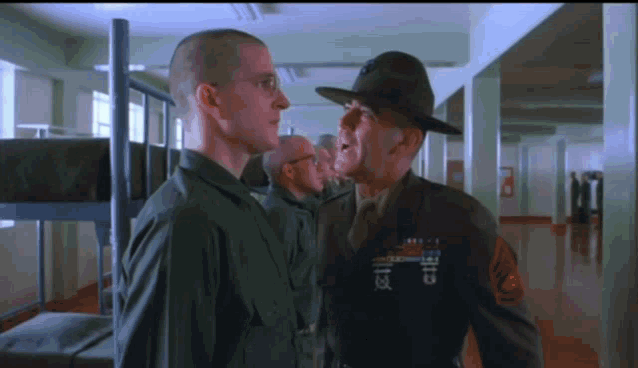 a man in a military uniform has a patch on his arm that says ' sd '