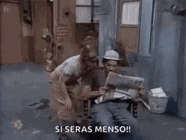 a man wearing a hat and sunglasses is holding a piece of paper and says `` si seras menso '' .