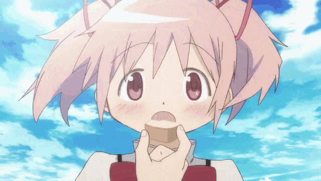 a close up of a girl with pink hair