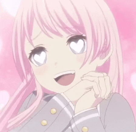 a pink haired anime girl with a heart in her eyes is smiling and holding her hand to her chin .