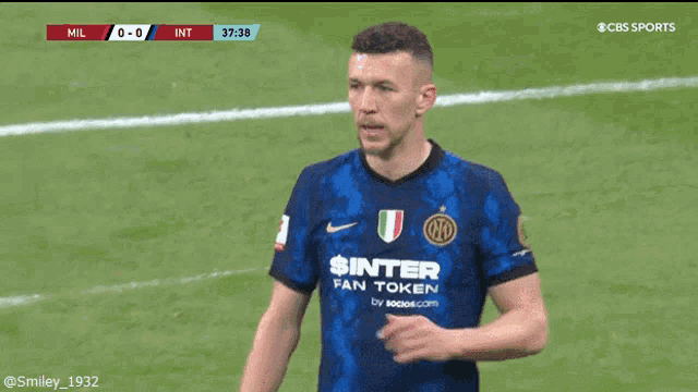 a soccer player wearing a shirt that says inter fan token