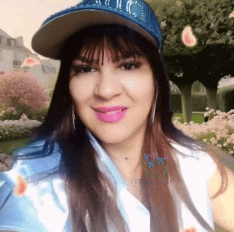 a woman wearing a baseball cap that says chicago
