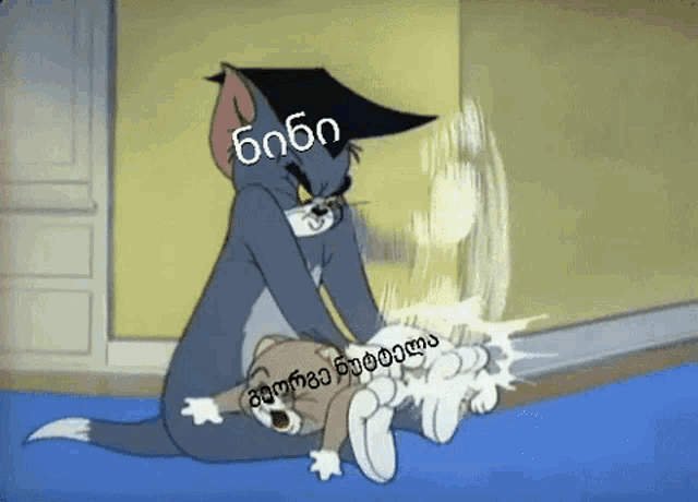 a cartoon of tom and jerry with foreign language written on it