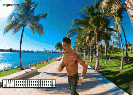 a shirtless man is running on a sidewalk in front of palm trees with the caption miamieeeeeeeeee