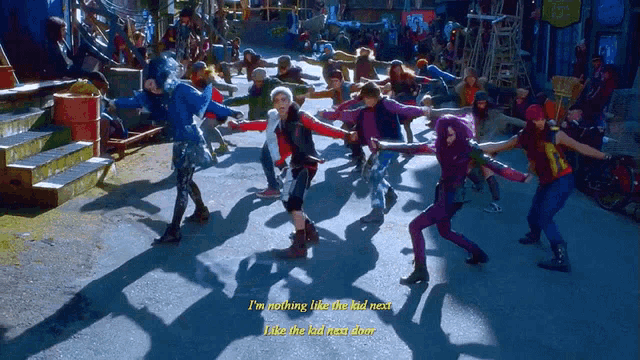 a group of people are dancing on a street with the words " i 'm nothing like the kid next door " on the bottom