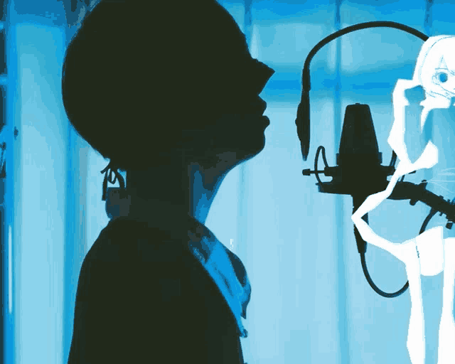 a silhouette of a woman singing into a microphone in front of a blue curtain