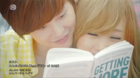 Couple Reading GIF - Couple Reading Book GIFs