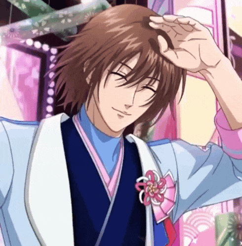 a man with brown hair is wearing a blue vest and a white shirt