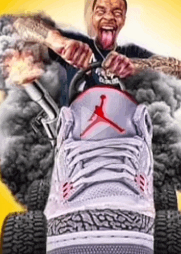 a man is riding a shoe with a jordan logo on it