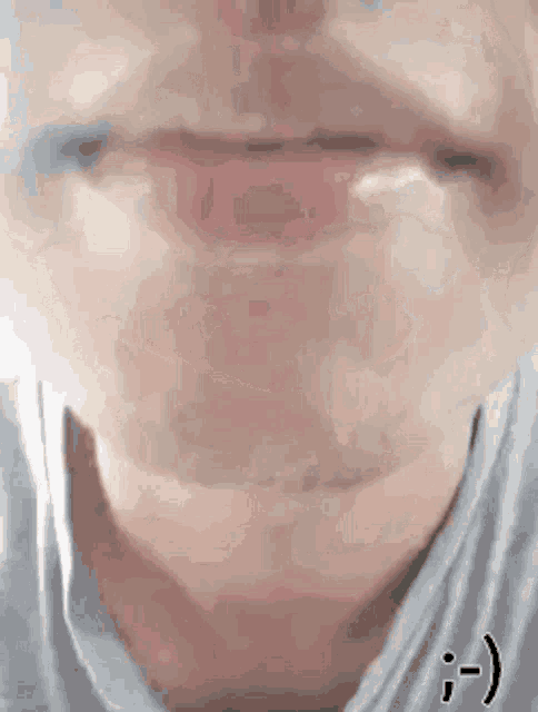 a close up of a person 's mouth with a smiley face .