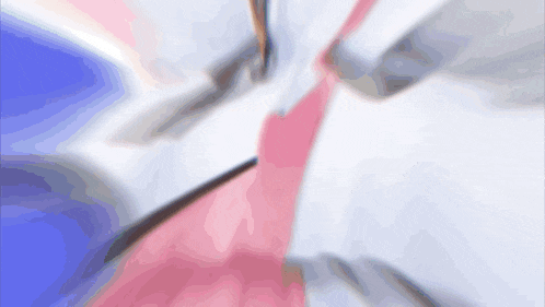a blurred image of a person 's feet with a pink tie