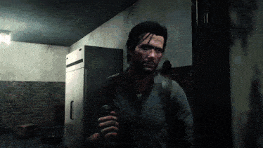 a man in a video game holding a flashlight