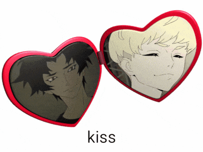 a red heart shaped mirror with a picture of a man and the word kiss below it